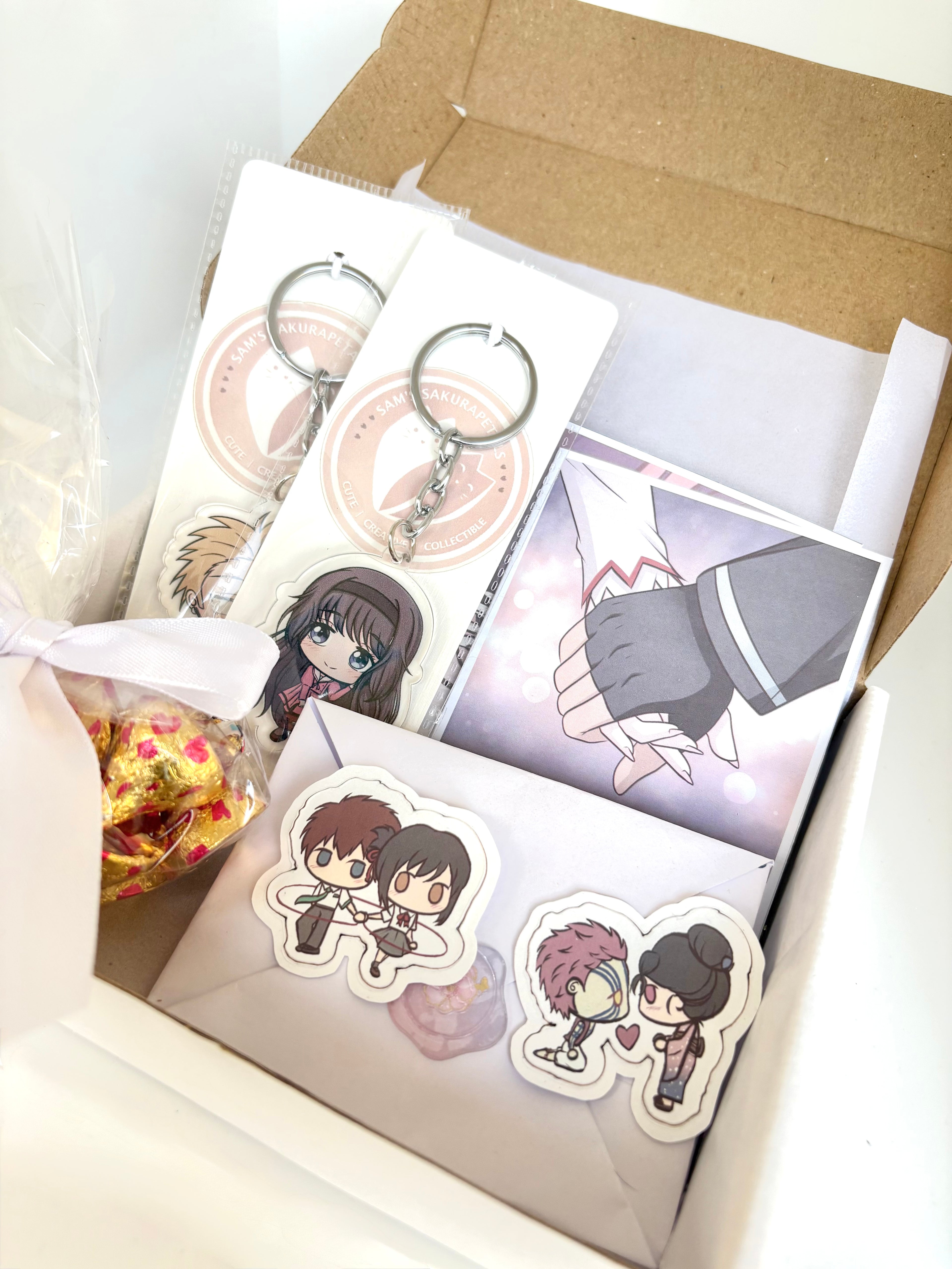 Anime Couple Gift Hamper displayed from a different angle showing the curated anime couple keepsakes inside the box