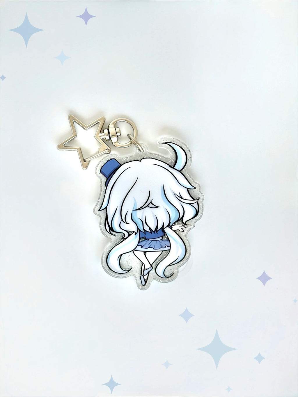 Back view of the Furina anime keychain showcasing a unique alternate art illustration with a sparkling glitter acrylic finish.