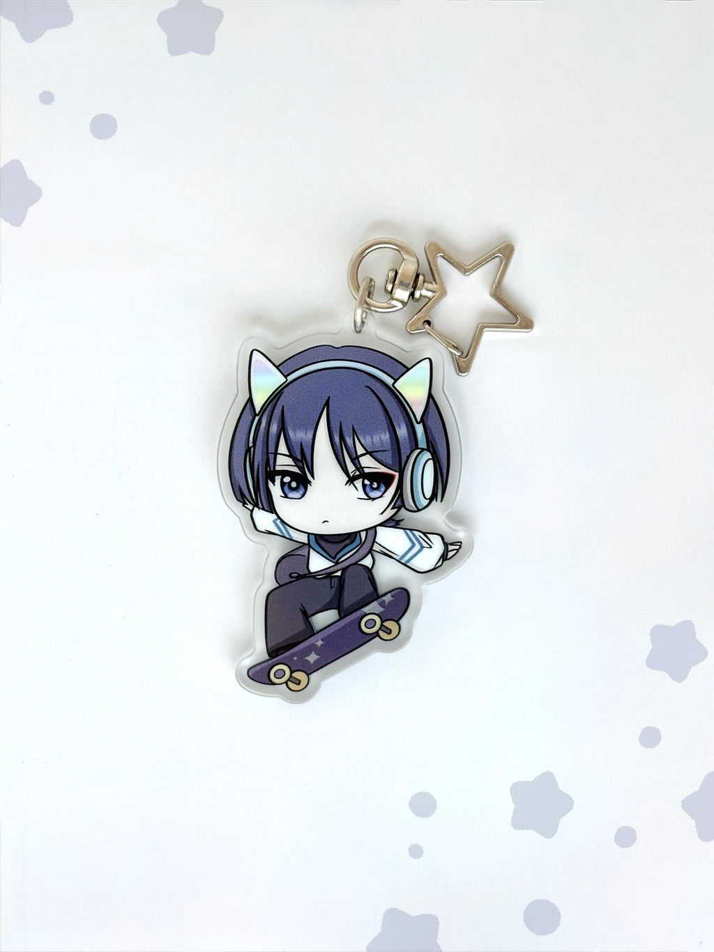 Front view of the Scaramouche double-sided anime keychain featuring vibrant character artwork.