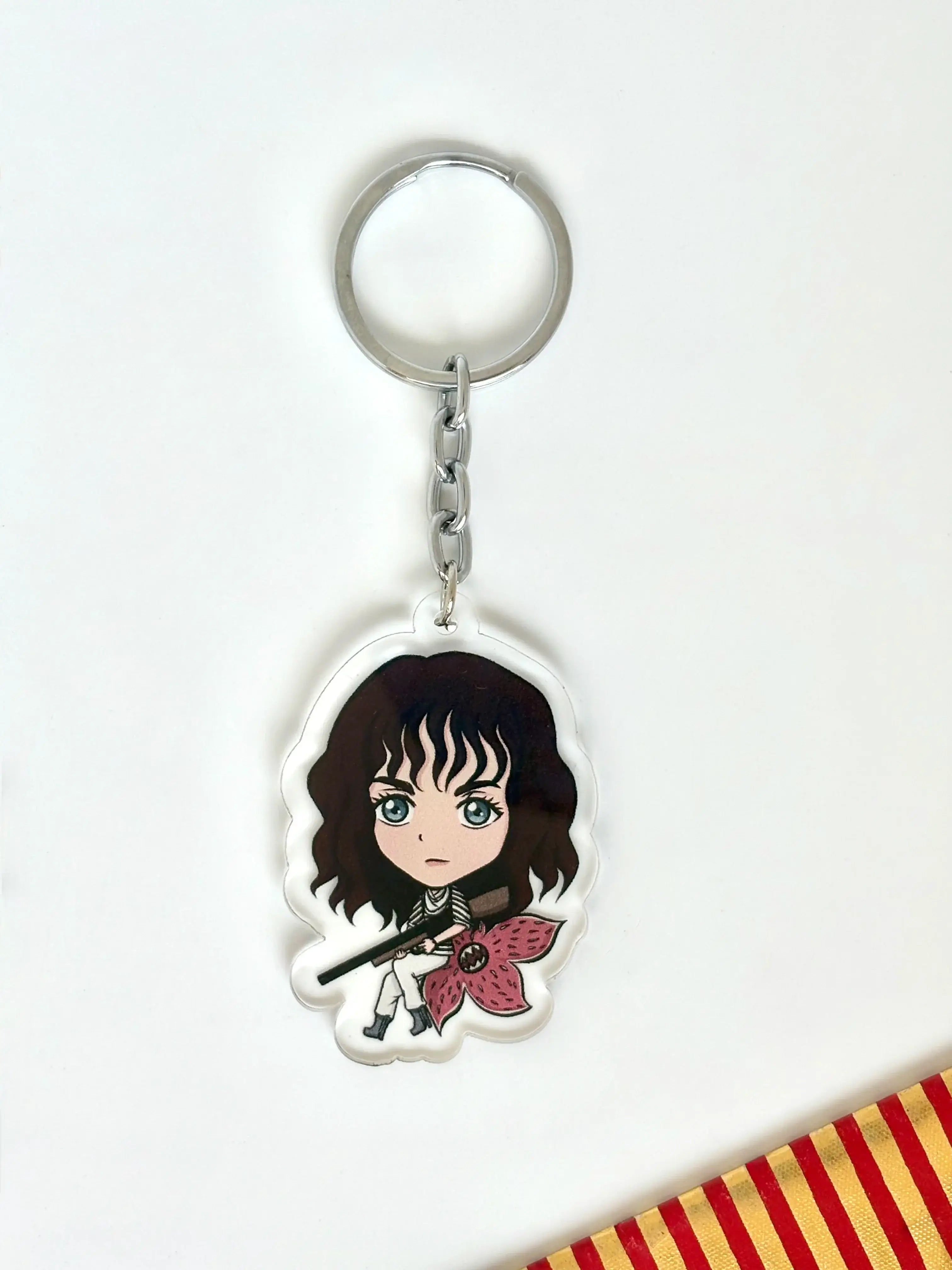 Stranger Things fan art keychain inspired by Nancy with chibi-style acrylic charm
